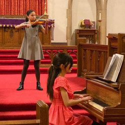 Lydia Menikefs and Isabella Boyd performing Long Long Ago Lydia Menikefs and Isabella Boyd performing Long Long Ago